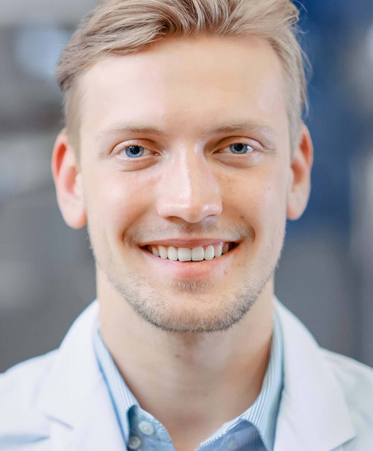 St. Albert Prosthodontist male model wearing white