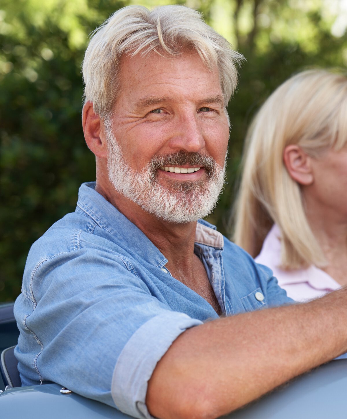 St Albert Dentures model wearing blue